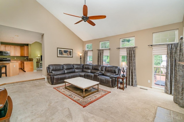 5200 Poets Way, Liberty Twp, OH 45011 - living area with high vaulted ceiling, a ceiling fan, light colored carpet, and plenty of natural light