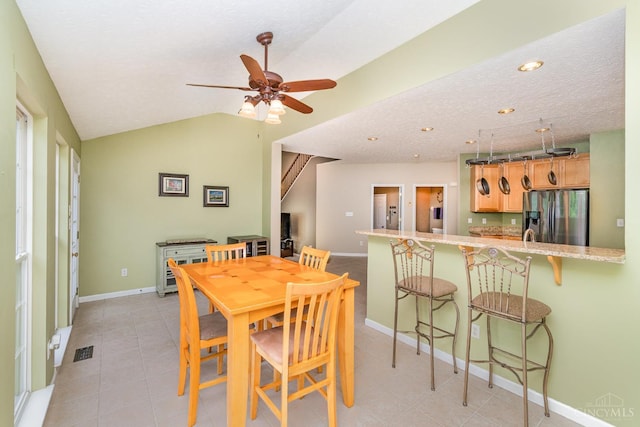 5200 Poets Way, Liberty Twp, OH 45011 - dining area with a ceiling fan, light tile patterned floors, recessed lighting, and vaulted ceiling
