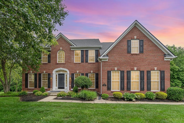 5200 Poets Way, Liberty Twp, OH 45011 - colonial home featuring brick siding and a front lawn