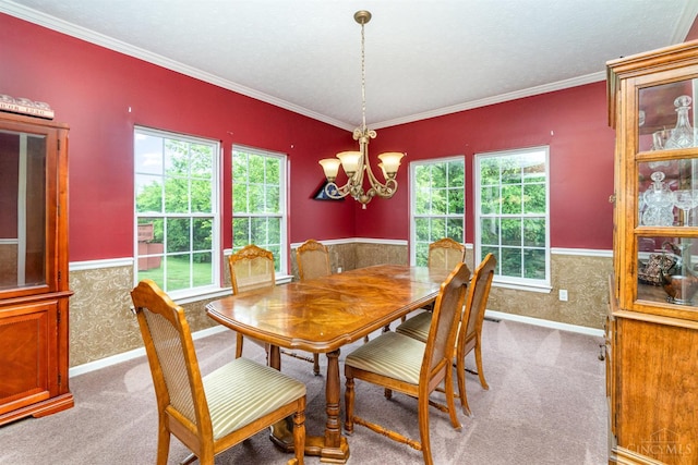 5200 Poets Way, Liberty Twp, OH 45011 - dining area featuring light carpet, a wainscoted wall, a chandelier, and crown molding