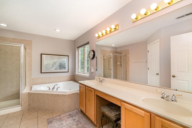 5200 Poets Way, Liberty Twp, OH 45011 - bathroom with tile patterned floors, a stall shower, double vanity, a jetted tub, and recessed lighting