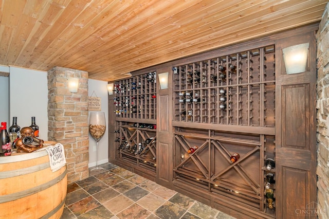 5200 Poets Way, Liberty Twp, OH 45011 - wine area featuring stone tile floors and wooden ceiling