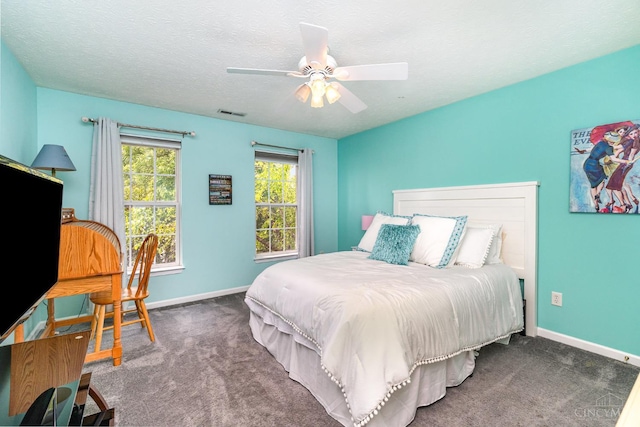 5200 Poets Way, Liberty Twp, OH 45011 - bedroom with carpet floors, ceiling fan, and a textured ceiling