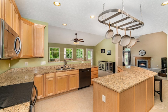 5200 Poets Way, Liberty Twp, OH 45011 - kitchen featuring stainless steel microwave, black dishwasher, open floor plan, electric stove, and a peninsula