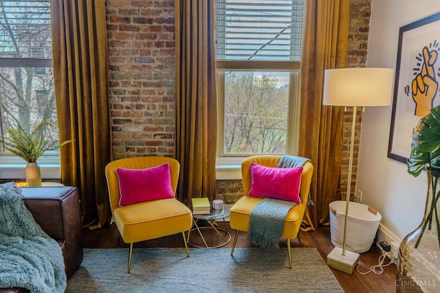 306 Mulberry St Unit 2, Cincinnati, OH 45202 - sitting room featuring wood finished floors and brick wall