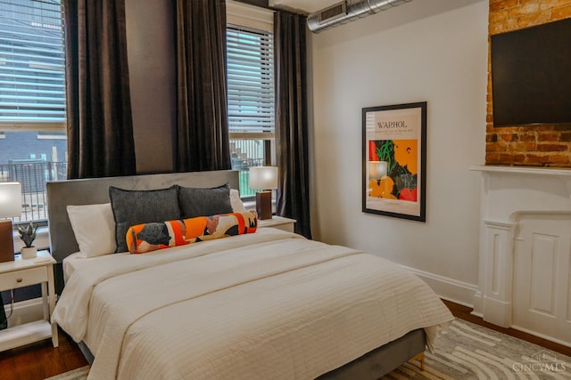306 Mulberry St Unit 2, Cincinnati, OH 45202 - bedroom with baseboards and wood finished floors