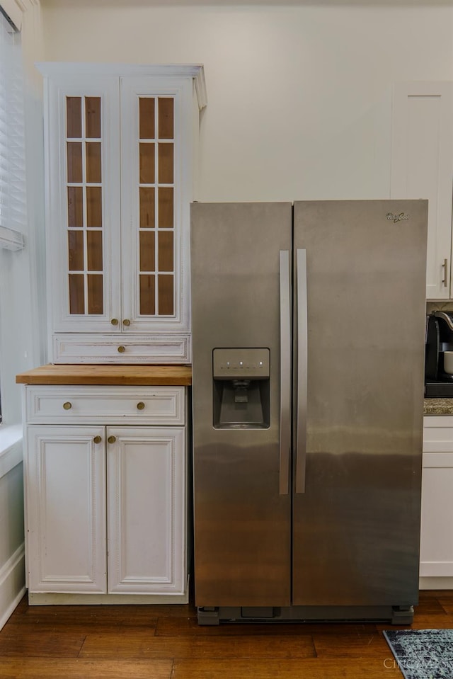 306 Mulberry St Unit 2, Cincinnati, OH 45202 - kitchen with stainless steel fridge with ice dispenser, butcher block countertops, white cabinetry, dark wood-style flooring, and glass insert cabinets
