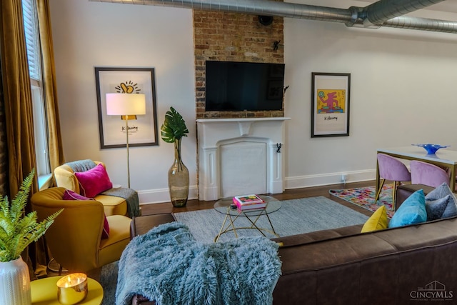 306 Mulberry St Unit 2, Cincinnati, OH 45202 - living area with wood finished floors and a fireplace