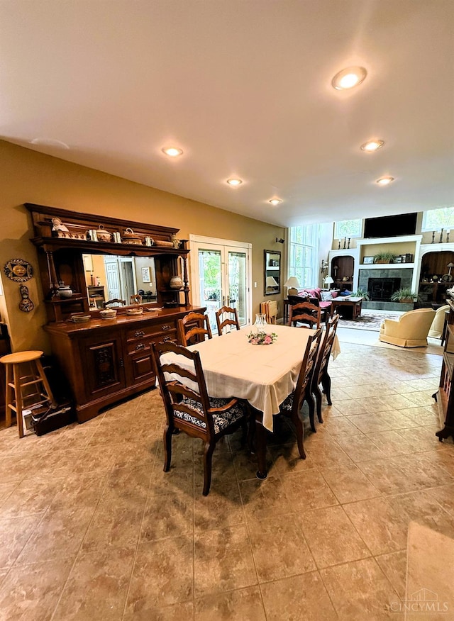 8030 Deershadow Ln, Montgomery, OH 45242 - dining area featuring a fireplace and recessed lighting