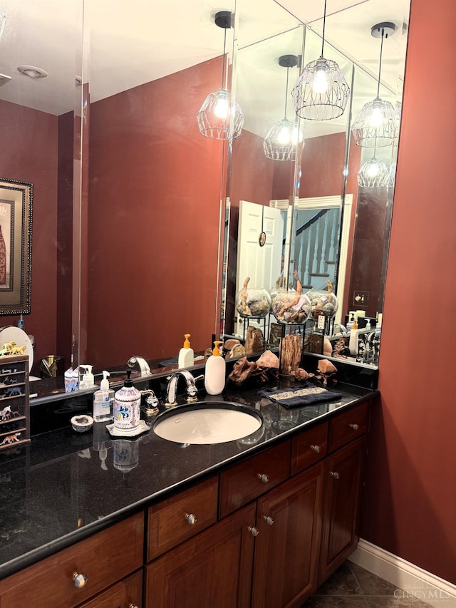 8030 Deershadow Ln, Montgomery, OH 45242 - bathroom featuring vanity and tile patterned flooring