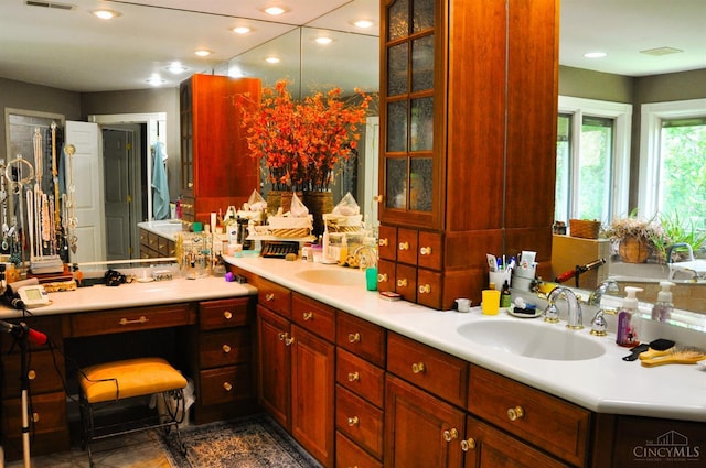 8030 Deershadow Ln, Montgomery, OH 45242 - full bath with double vanity and recessed lighting