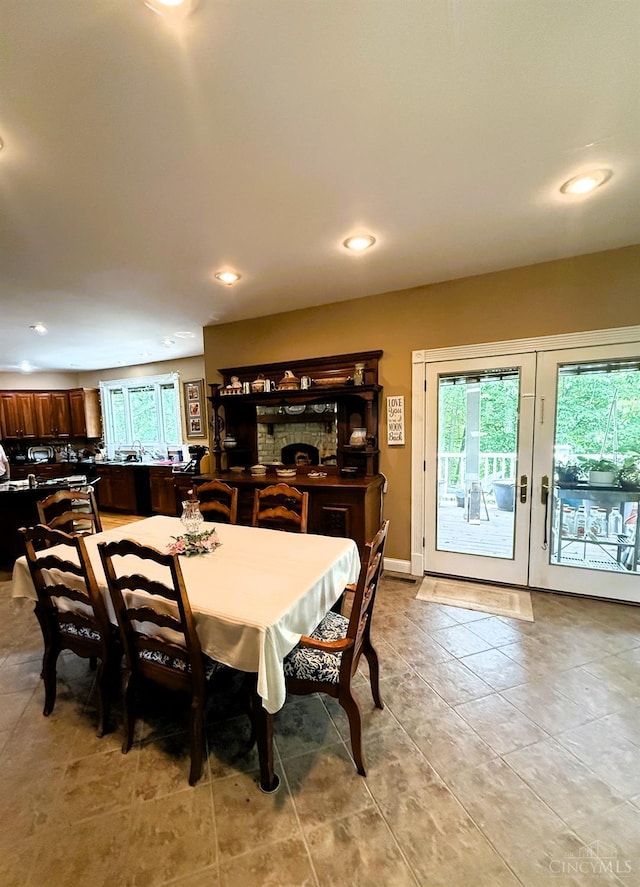 8030 Deershadow Ln, Montgomery, OH 45242 - dining area featuring recessed lighting, light tile patterned floors, and french doors