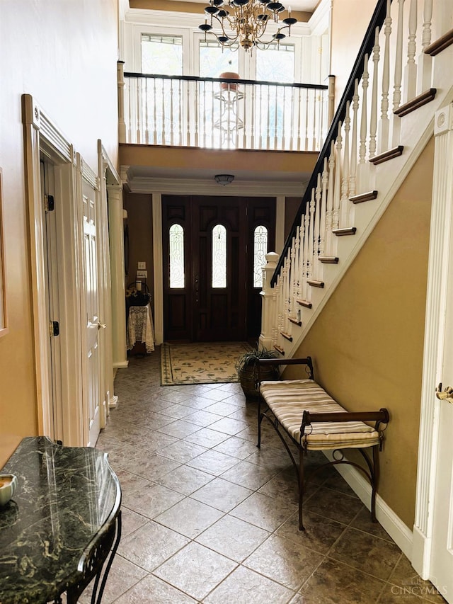 8030 Deershadow Ln, Montgomery, OH 45242 - entrance foyer featuring a towering ceiling, a chandelier, and stairway