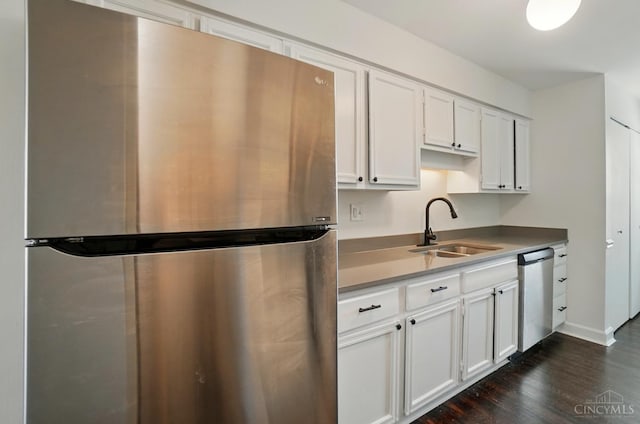 55 Stillmeadow Dr, Pierce Twp, OH 45245 - kitchen featuring appliances with stainless steel finishes, dark wood-type flooring, and white cabinets