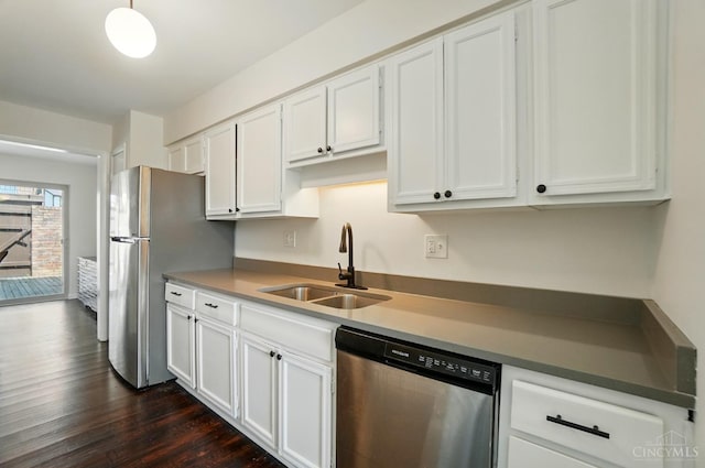 55 Stillmeadow Dr, Pierce Twp, OH 45245 - kitchen with appliances with stainless steel finishes, white cabinets, and dark wood-style flooring