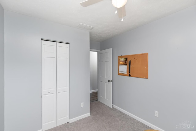 13726 New Harmony Shiloh Rd, Pike Twp, OH 45154 - unfurnished bedroom with carpet, a closet, and ceiling fan