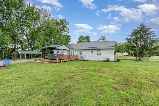 13726 New Harmony Shiloh Rd, Pike Twp, OH 45154 - rear view of house with a deck, a carport, and a metal roof
