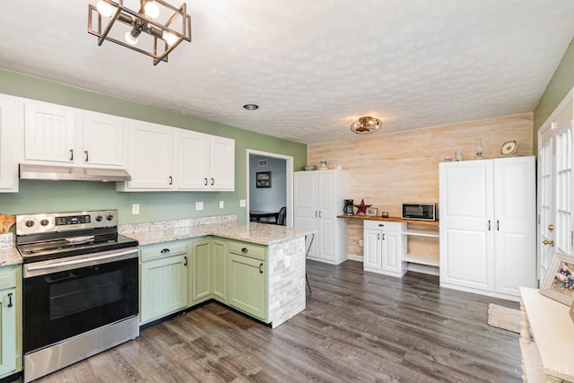 13726 New Harmony Shiloh Rd, Pike Twp, OH 45154 - kitchen featuring stainless steel electric range, under cabinet range hood, a peninsula, dark wood-style flooring, and green cabinets