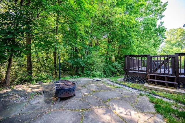 9930 Tall Oaks Ct, Deerfield Twp, OH 45140 - view of patio / terrace featuring a fire pit and a wooden deck