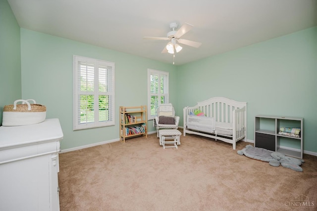 9930 Tall Oaks Ct, Deerfield Twp, OH 45140 - bedroom with carpet floors, a crib, and a ceiling fan