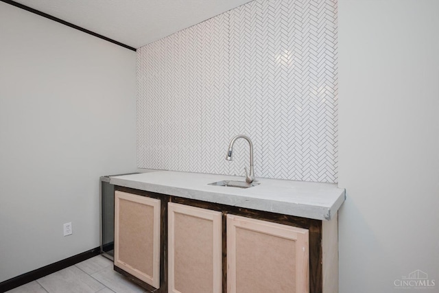 9930 Tall Oaks Ct, Deerfield Twp, OH 45140 - bar area with a sink and light tile patterned floors