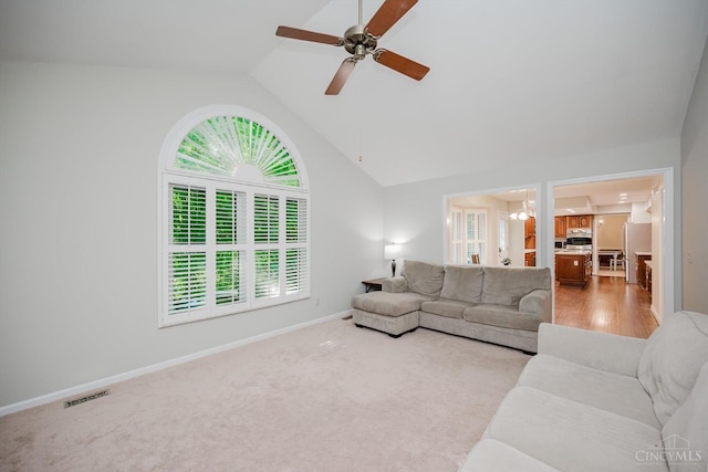 9930 Tall Oaks Ct, Deerfield Twp, OH 45140 - living area with vaulted ceiling, a ceiling fan, healthy amount of natural light, and a chandelier