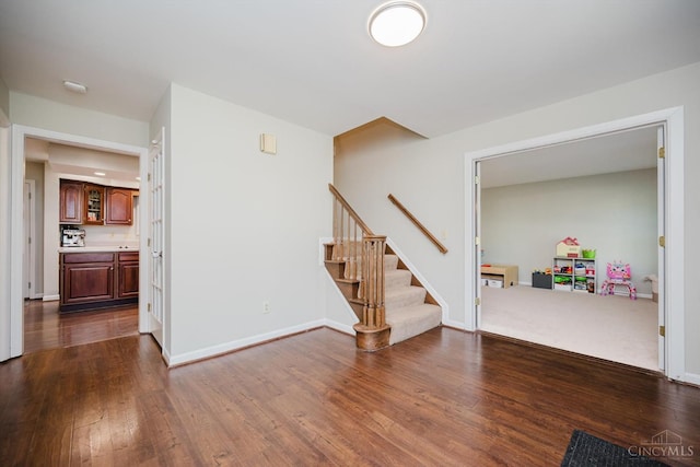 9930 Tall Oaks Ct, Deerfield Twp, OH 45140 - living area with stairs and dark wood-type flooring