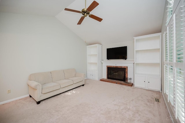 9930 Tall Oaks Ct, Deerfield Twp, OH 45140 - carpeted living area featuring ceiling fan, a fireplace, vaulted ceiling, and plenty of natural light