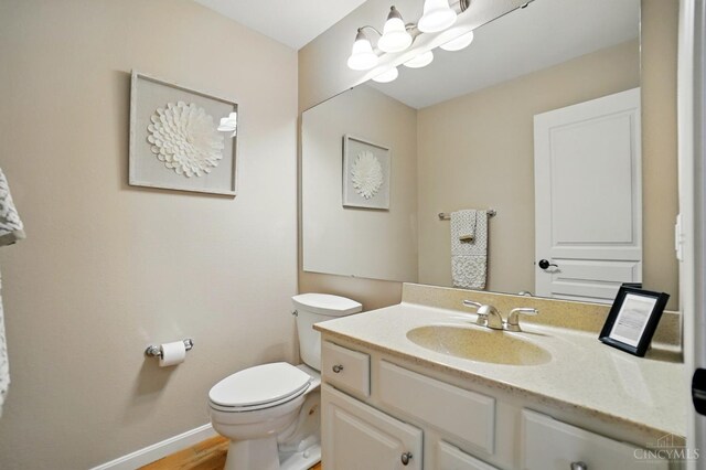 3492 Ballymore Ct, Pierce Twp, OH 45245 - half bathroom with vanity and wood finished floors