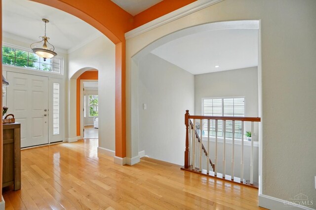 3492 Ballymore Ct, Pierce Twp, OH 45245 - foyer entrance featuring arched walkways and light wood finished floors