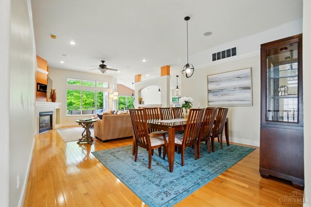 3492 Ballymore Ct, Pierce Twp, OH 45245 - dining area featuring a ceiling fan, a tile fireplace, light wood finished floors, and recessed lighting