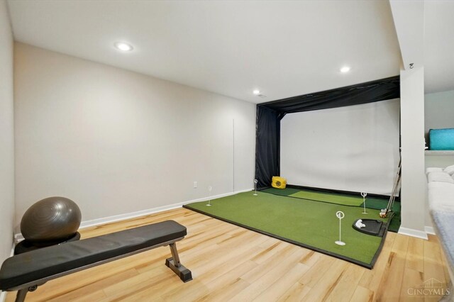 3492 Ballymore Ct, Pierce Twp, OH 45245 - game room featuring wood finished floors, recessed lighting, and golf simulator