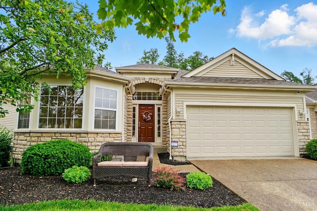3492 Ballymore Ct, Pierce Twp, OH 45245 - ranch-style home featuring stone siding, driveway, an attached garage, and a shingled roof
