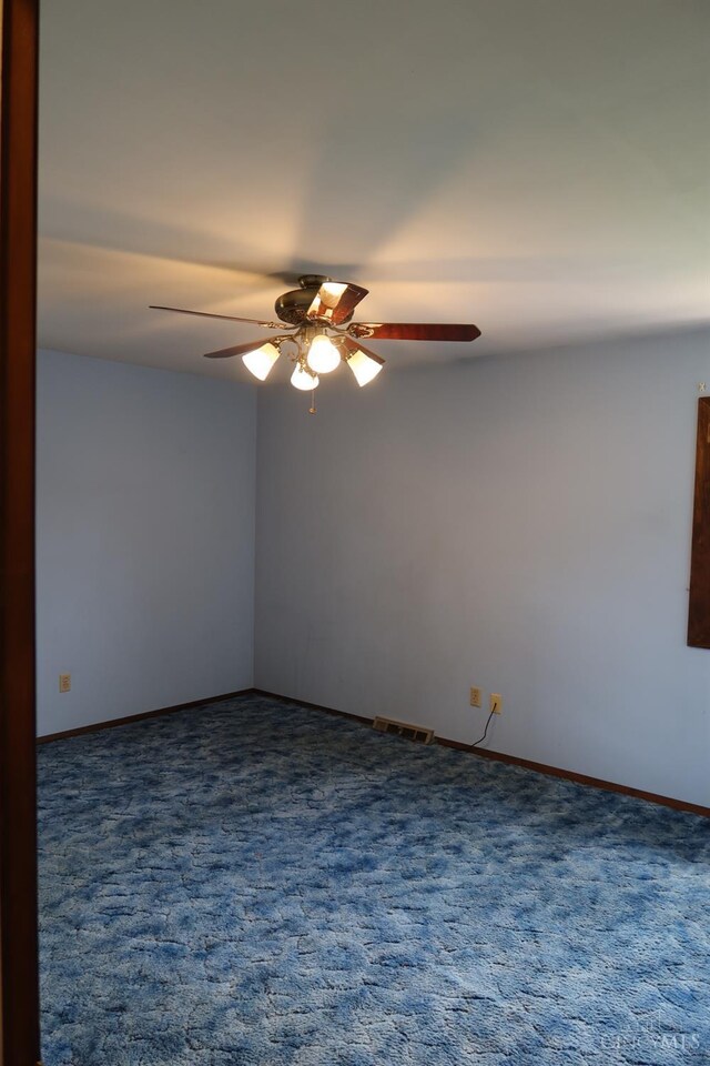 704 Trafalgar Ct, Middletown, OH 45044 - empty room with a ceiling fan and carpet floors