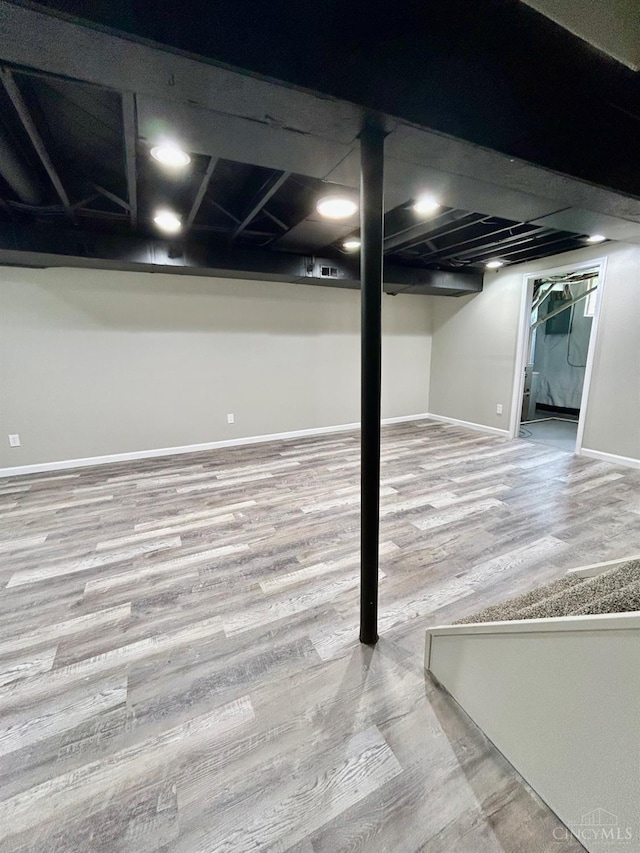 3501 Mcfarlan Rd, Cincinnati, OH 45211 - finished basement featuring baseboards and wood finished floors
