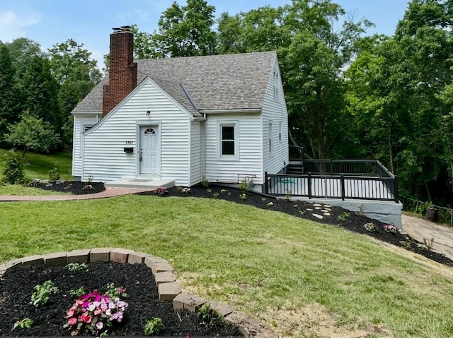 3501 Mcfarlan Rd, Cincinnati, OH 45211 - view of front facade featuring roof with shingles, a chimney, a deck, and a front lawn