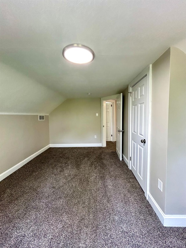 3501 Mcfarlan Rd, Cincinnati, OH 45211 - bonus room with dark carpet and lofted ceiling