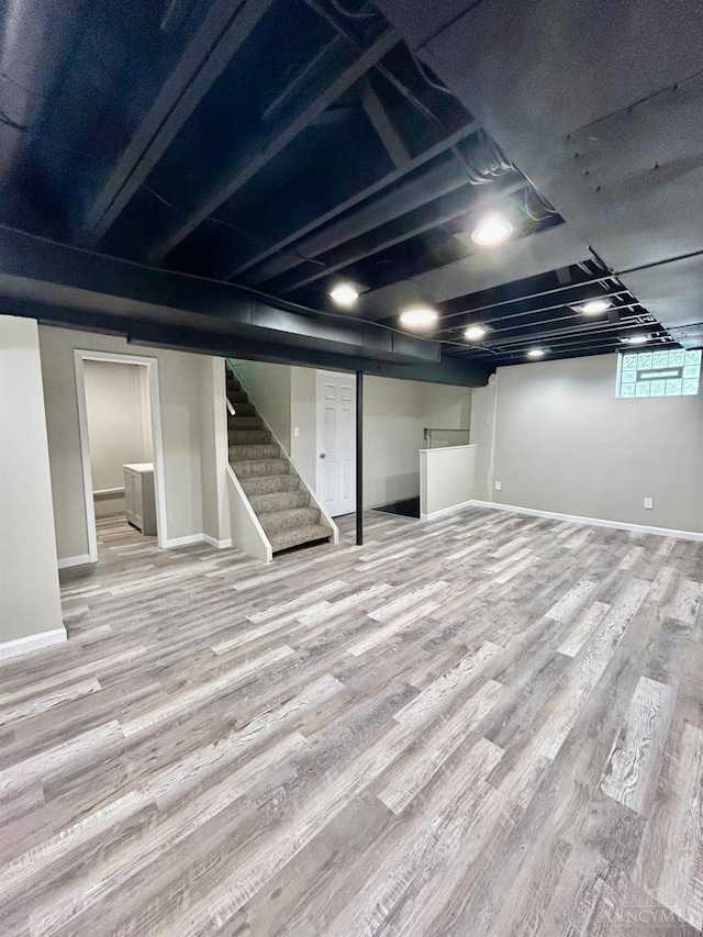 3501 Mcfarlan Rd, Cincinnati, OH 45211 - basement with wood finished floors and stairs