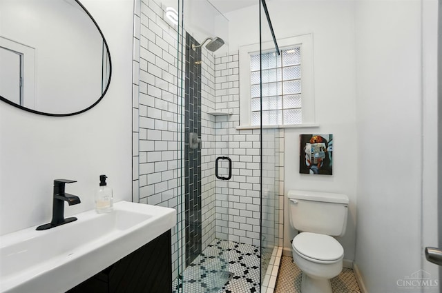 7002 Cambridge Ave, Columbia Twp, OH 45227 - bathroom featuring a shower stall, tile patterned floors, and vanity