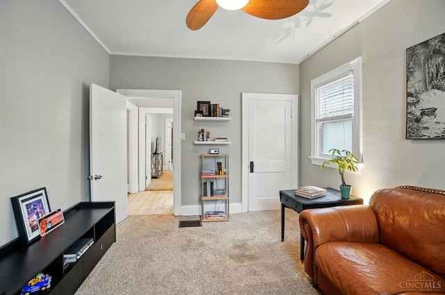 7002 Cambridge Ave, Columbia Twp, OH 45227 - sitting room with carpet floors, a ceiling fan, and crown molding