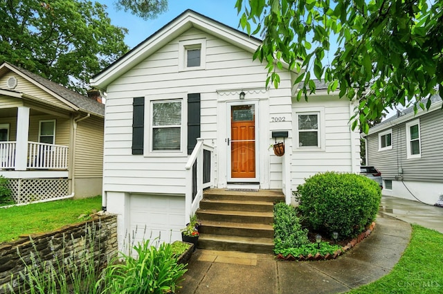7002 Cambridge Ave, Columbia Twp, OH 45227 - shotgun-style home featuring a garage