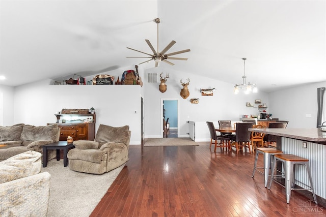 6226 Hunt Rd, Wayne Twp, OH 45118 - living area featuring dark wood-type flooring, ceiling fan, lofted ceiling, and a chandelier