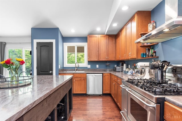6226 Hunt Rd, Wayne Twp, OH 45118 - kitchen featuring wall chimney range hood, stainless steel appliances, healthy amount of natural light, recessed lighting, and dark wood-style flooring