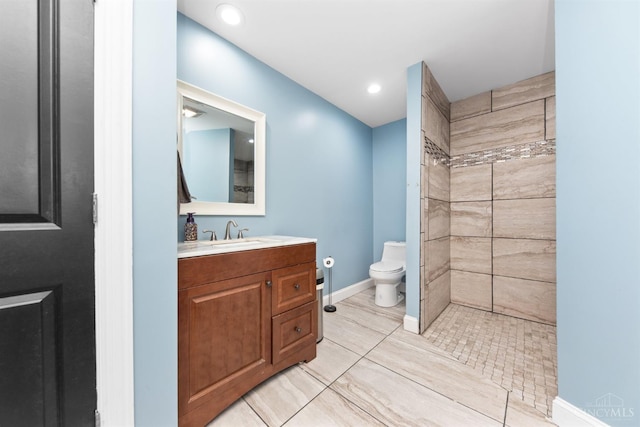 6226 Hunt Rd, Wayne Twp, OH 45118 - bathroom with vanity, a tile shower, recessed lighting, and tile patterned flooring