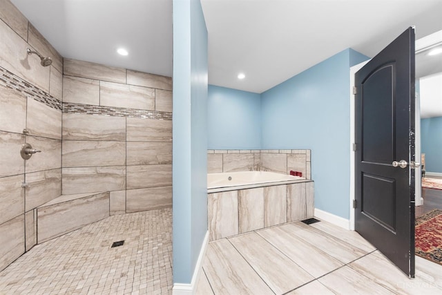6226 Hunt Rd, Wayne Twp, OH 45118 - bathroom featuring a bath, tiled shower, and recessed lighting