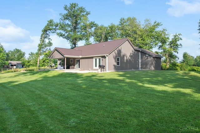 6226 Hunt Rd, Wayne Twp, OH 45118 - back of house featuring a lawn and a patio