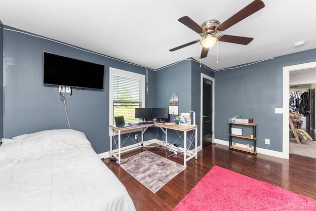 6226 Hunt Rd, Wayne Twp, OH 45118 - bedroom with wood finished floors, an office area, and ceiling fan