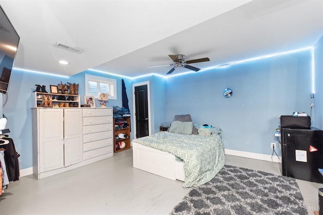 6226 Hunt Rd, Wayne Twp, OH 45118 - bedroom with concrete floors and a ceiling fan