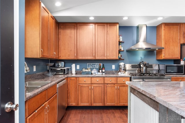 6226 Hunt Rd, Wayne Twp, OH 45118 - kitchen with wall chimney range hood, appliances with stainless steel finishes, brown cabinetry, dark wood-type flooring, and recessed lighting