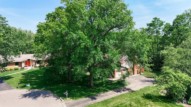 10730 Adventure Ln, Montgomery, OH 45242 - view of community featuring driveway and an attached garage